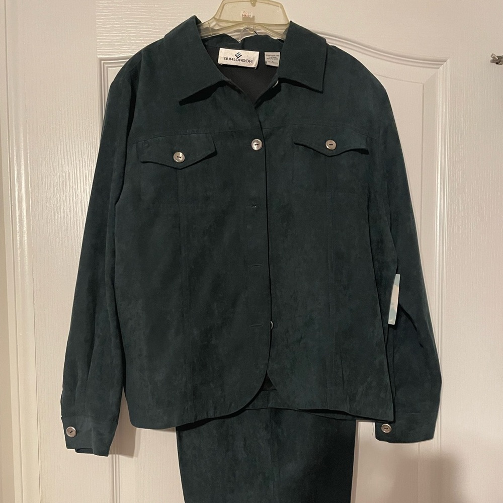 Brand New. Never worn with tags. Two piece suede pantsuit.